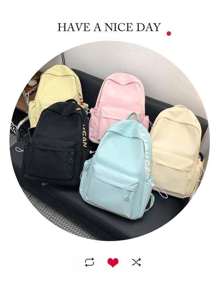 Damen Rucksack mit Buchstabenaufdruck, große Kapazität, neue Mode - Einfarbige Reise-Schultertasche für die Mittelschule