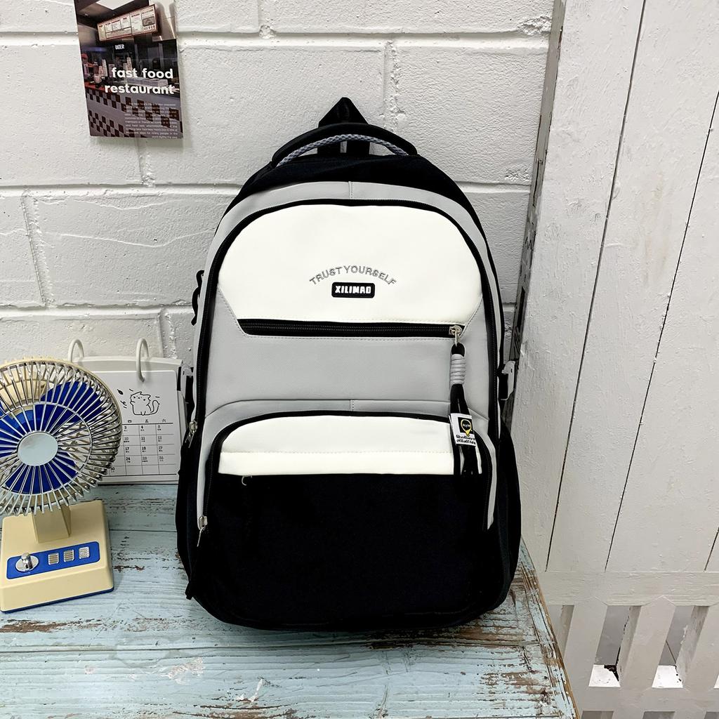 Schoolbag trendy cool new contrasting color backpack Korean version Mori large capacity high value backpack junior high school student schoolbag