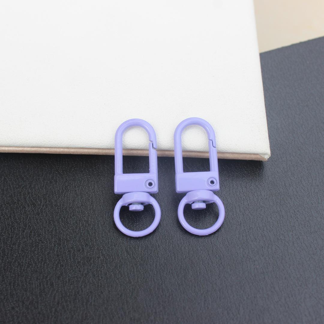 

Пряжка для ювелірних дверей із цинкового сплаву, що обертається, — гальванічний металевий пружинний брелок