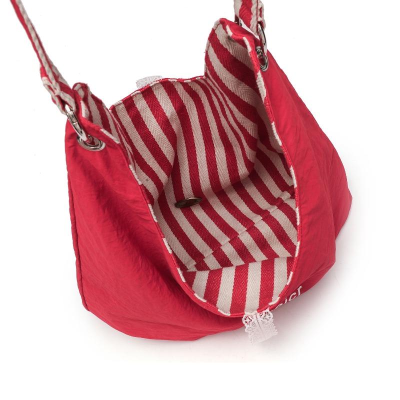 Große gestreifte Tasche doppelseitige Tragetasche Pendler Canvas Tasche Unterarm Wind Pendler Damen Kapazität Student Schultertasche