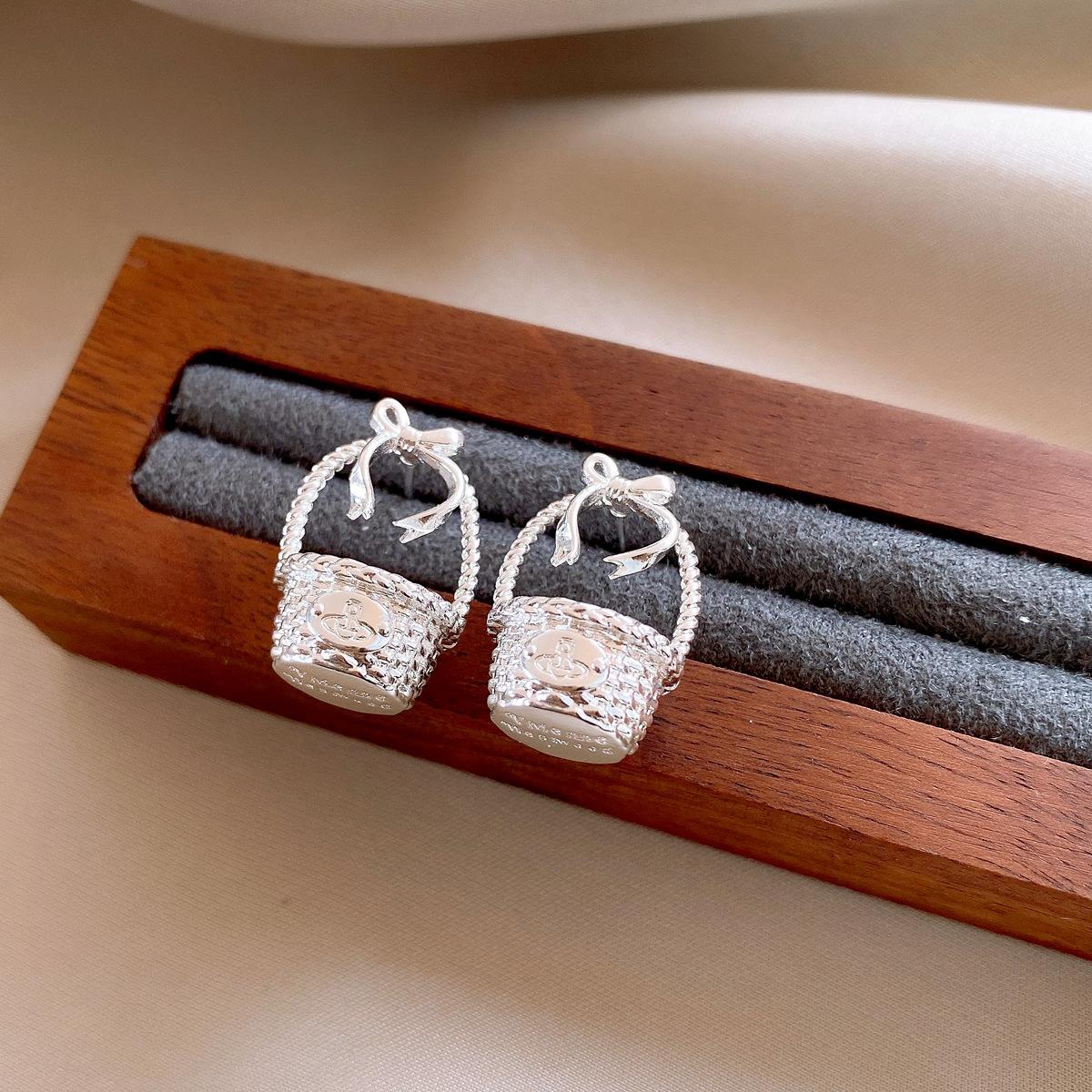 

European and American flower basket bow earrings stud earrings women s personality earrings