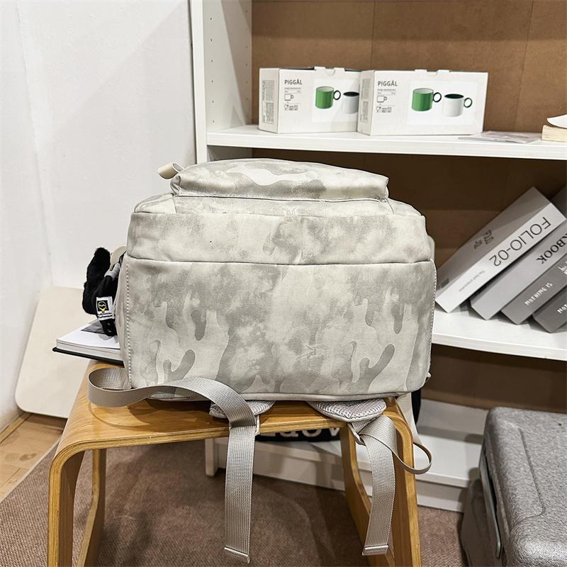 Splashed Ink Printing Backpack for Men & Women – Trendy Lightweight School Bag with Multiple Pockets & Adjustable Straps – Perfect for Daily Use