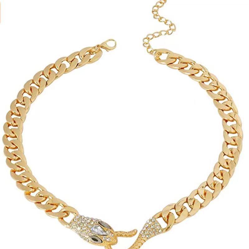 

Европейский и американский чокер «Черная змея»: Колье-цепочка на ключицу в виде змеи золотой