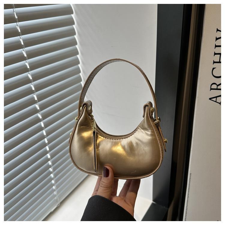 

Нишевый дизайн модная и милая инс мини-сумка женская в иностранном стиле 2025 новая портативная сумка-полумесяц золотой