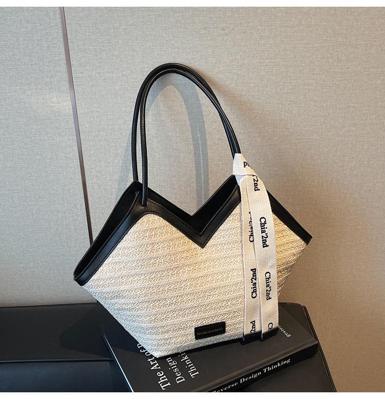 Große gewebte Strohtasche Damen Frühling und Sommer 2025 neu Nische Single Shoulder Strandurlaub Strand Tragetasche