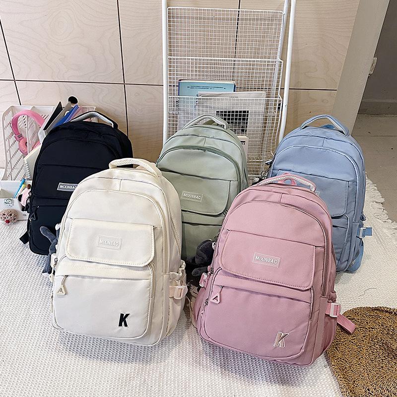 New large-capacity multi-compartment lightweight and versatile backpack fashionable junior high school high school student college backpack