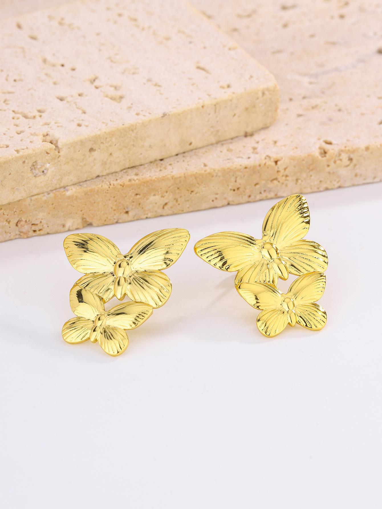 French temperament butterfly leaf flower water drop titanium steel titanium steel stud earrings niche temperament 11K advanced sense