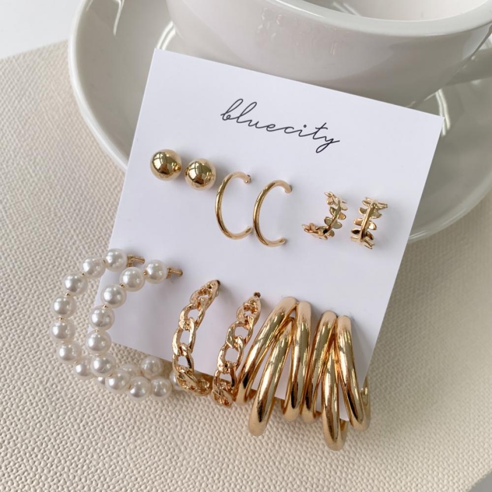 

Комплект серег-гвоздиков Blue City из 12 жемчужных листьев