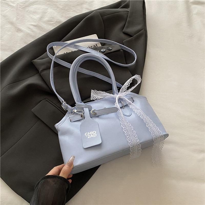 

Spring and summer portable shell bag women s new trendy high-end sense niche fashion commuter hand carry shoulder messenger bag синій