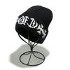 ins autumn and winter Korean version casual Sanskrit knitted hat out of the street couple wool hat men's and women's ear protection warm cold 