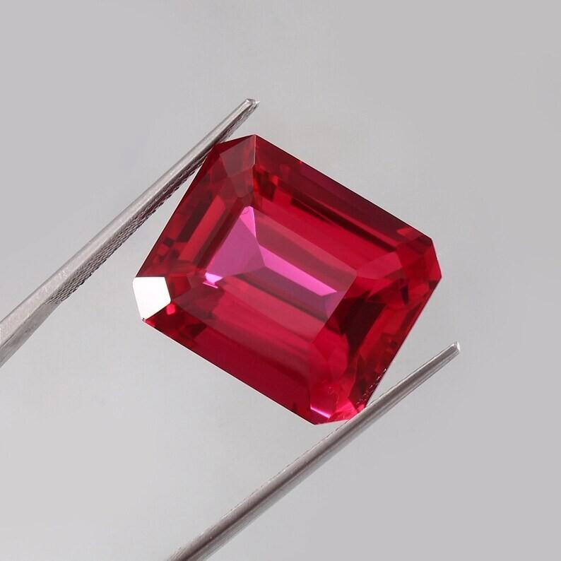 AAA 10x7 MM Flawless Blood Red Ruby Emerald Cut Loose Gemstone Mozambique