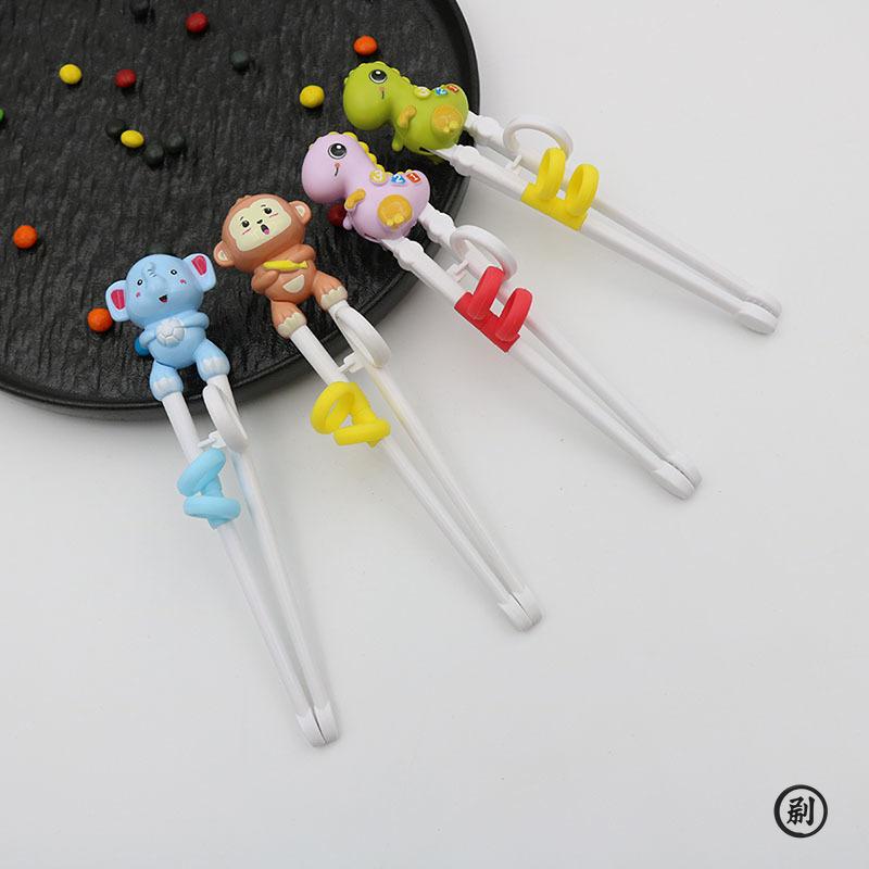 1 pár tréninkových hůlek, dětský pomocník pro učení se hůlkami, hůlky pro začátečníky ve tvaru zvířátek, opakovaně použitelné asistenční hůlky