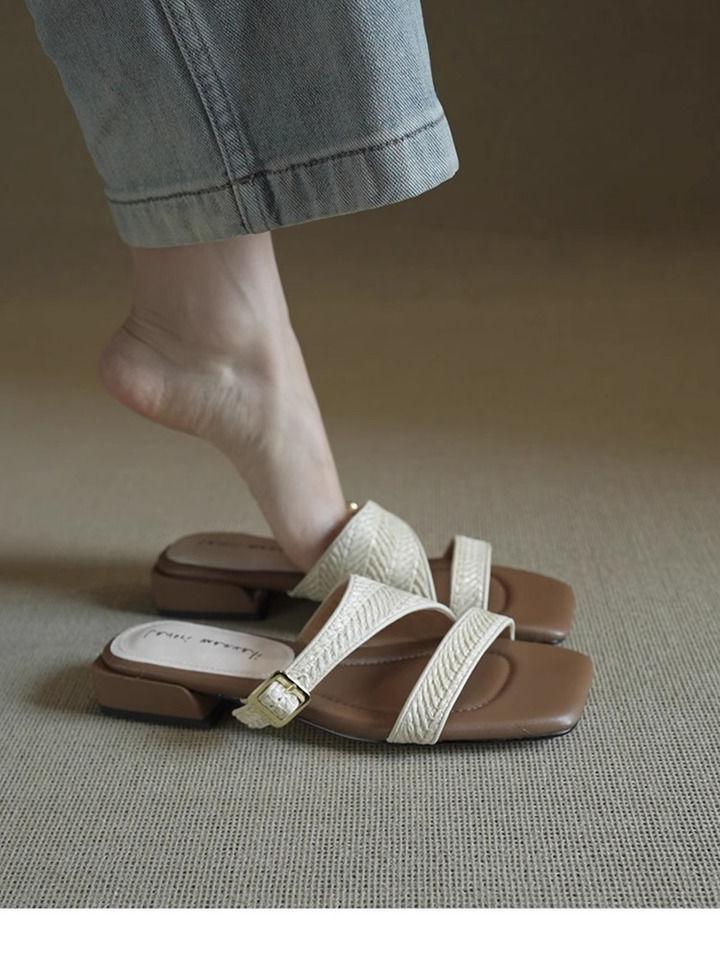 Irregular sense of design, straw-woven cool slippers for women's 2025 new holiday style, square head, middle heel, and one-word drag foreign style