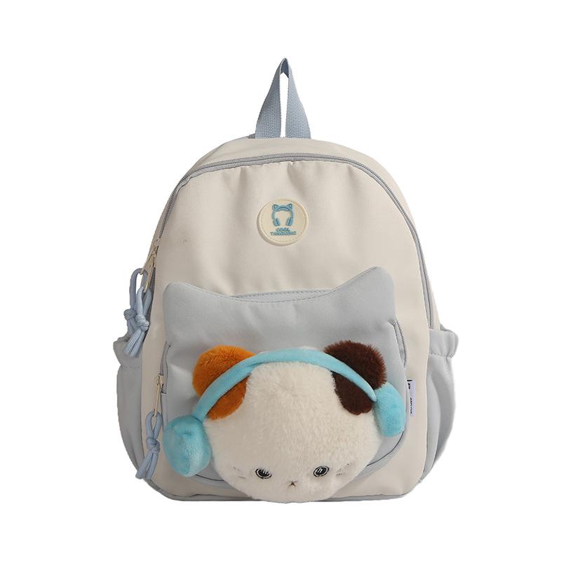 Cute Cartoon Trendy Backpack: Large Capacity, Lightweight, Versatile Travel/School Bag with Earphone and Doll Holder.