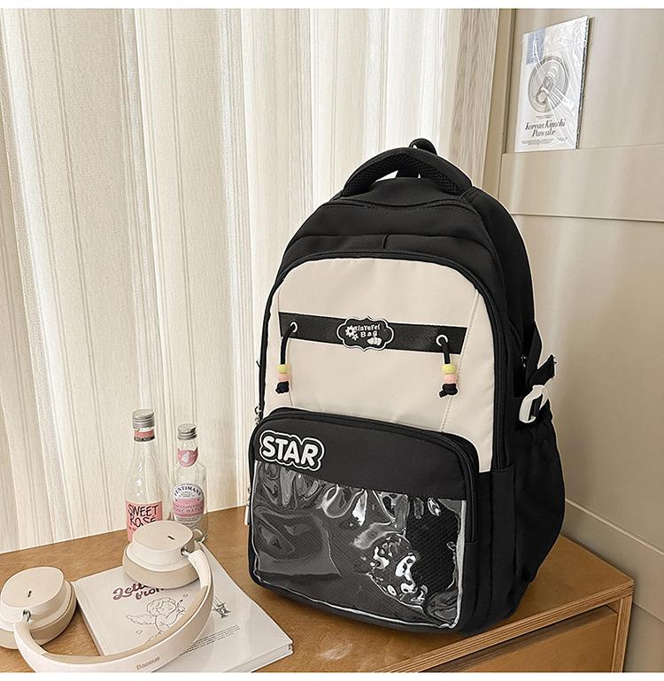 Small fresh contrasting color schoolbag niche design casual versatile children's backpack high value light burden reduction shoulder