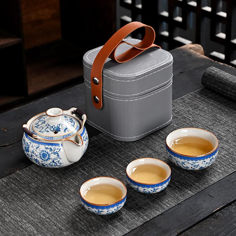 Ru kiln twisted branch lotus, a pot of three cups of travel tea set, a complete set of express cup outdoor portable bag, brewing teapot