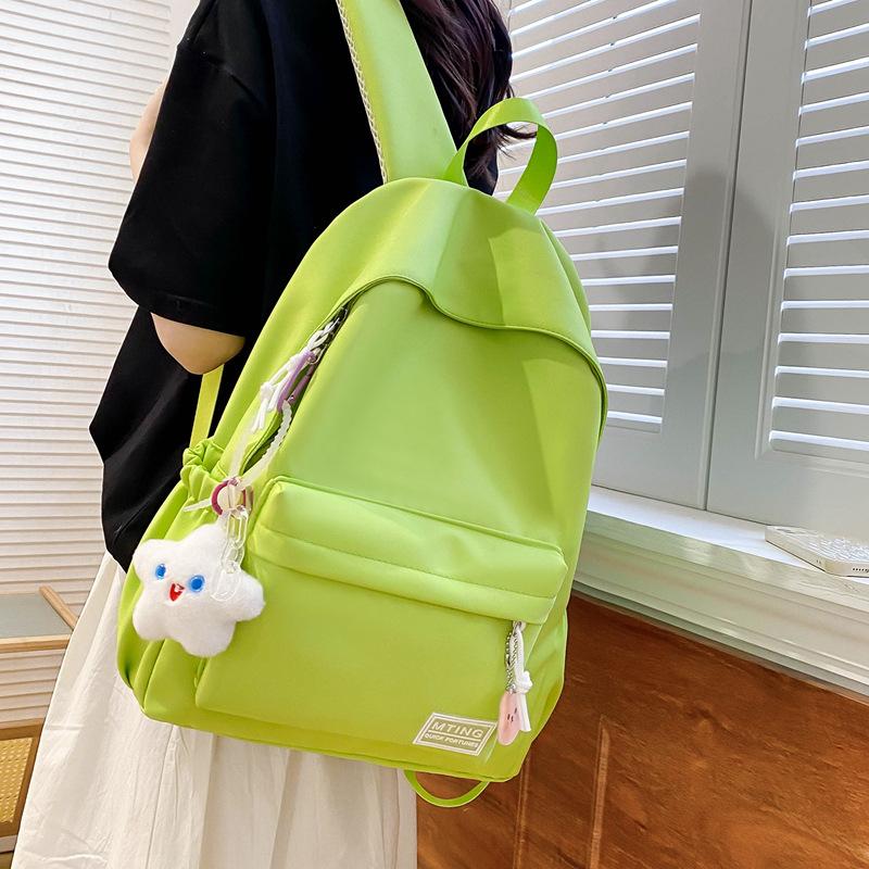 Small fresh girl backpack Japanese solid color schoolbag female Korean version ins versatile large capacity student backpack new