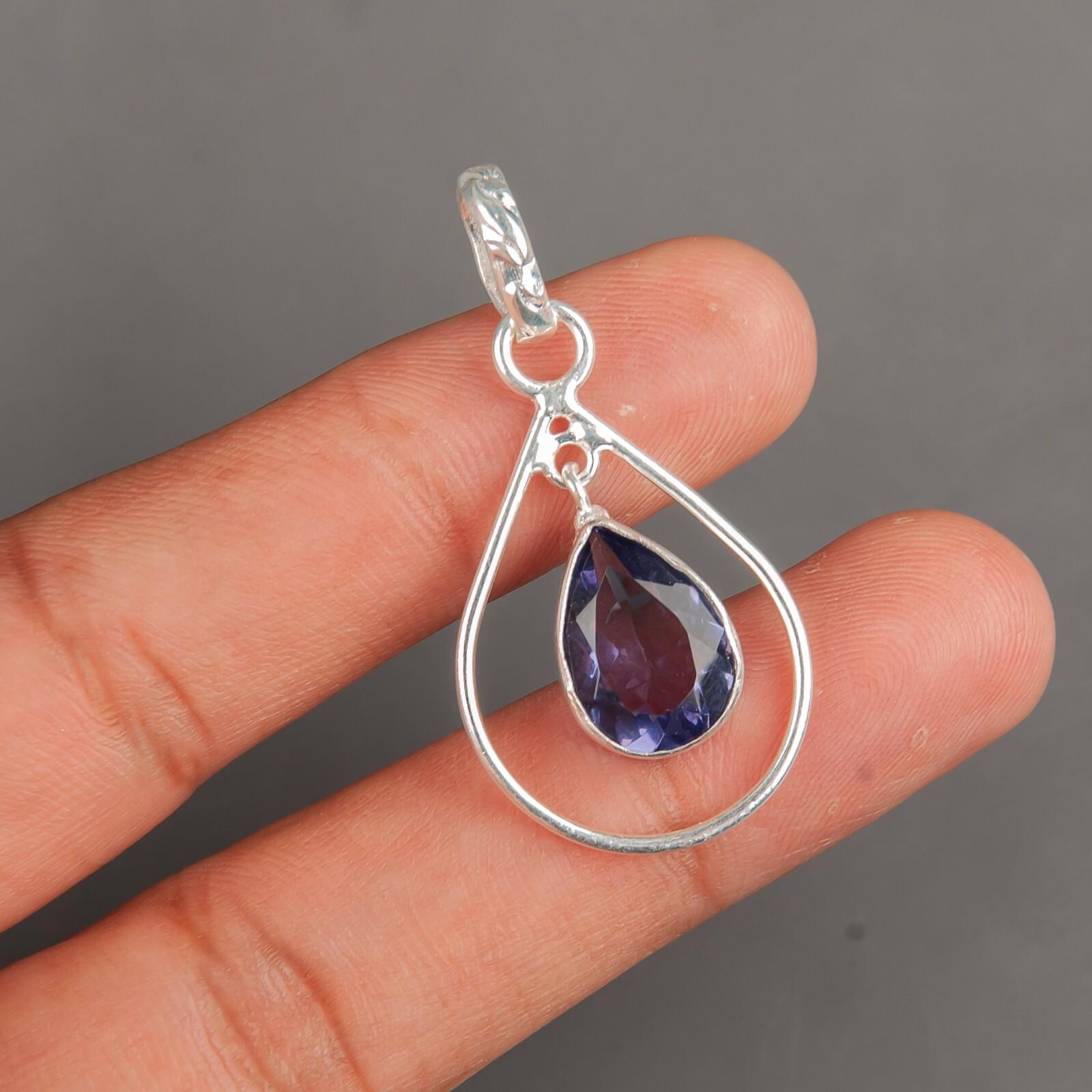 

Иолит Драгоценный камень 925 Стерлинговое серебро Ювелирные изделия Ручной работы Эффектная подвеска 1,60 PP-3-7