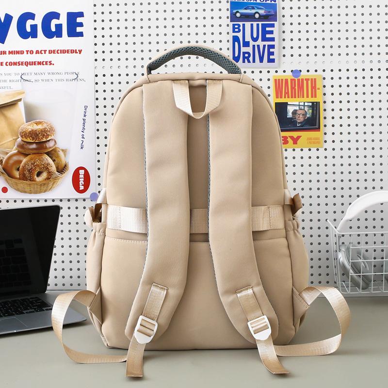 New college student backpack, simple high-value backpack, girls' large-capacity junior high school student schoolbag