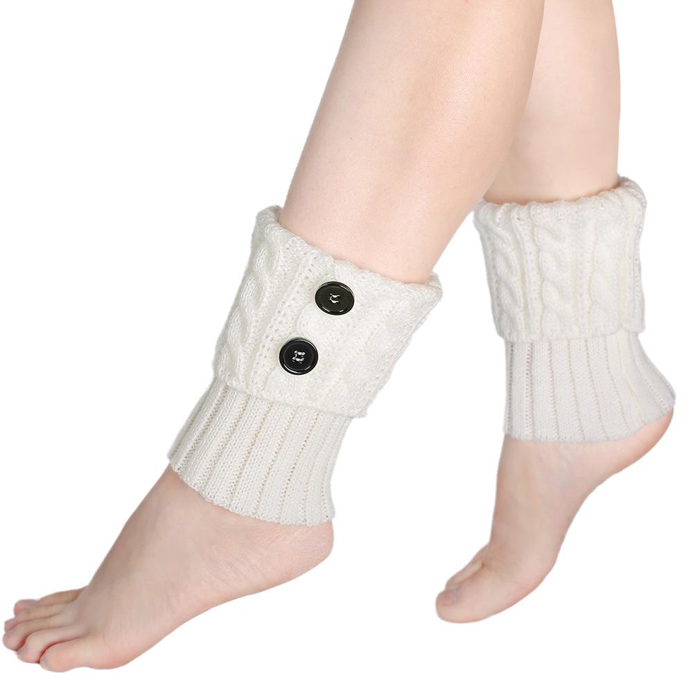 Dicke Wollsocken mit gedrehten Knöpfen für Zehenschoner und kurze Stiefelstulpen für winterliche Wärme