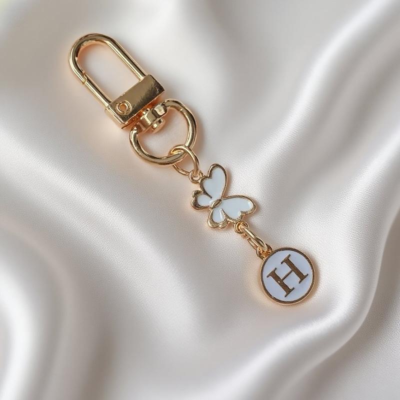 Metalowy Brelok z Literą Motyla A-Z 26 Liter Brelok Urok Uchwyt na Klucze Samochodowe Zawieszka do Torby Akcesoria Biżuteria Prezent