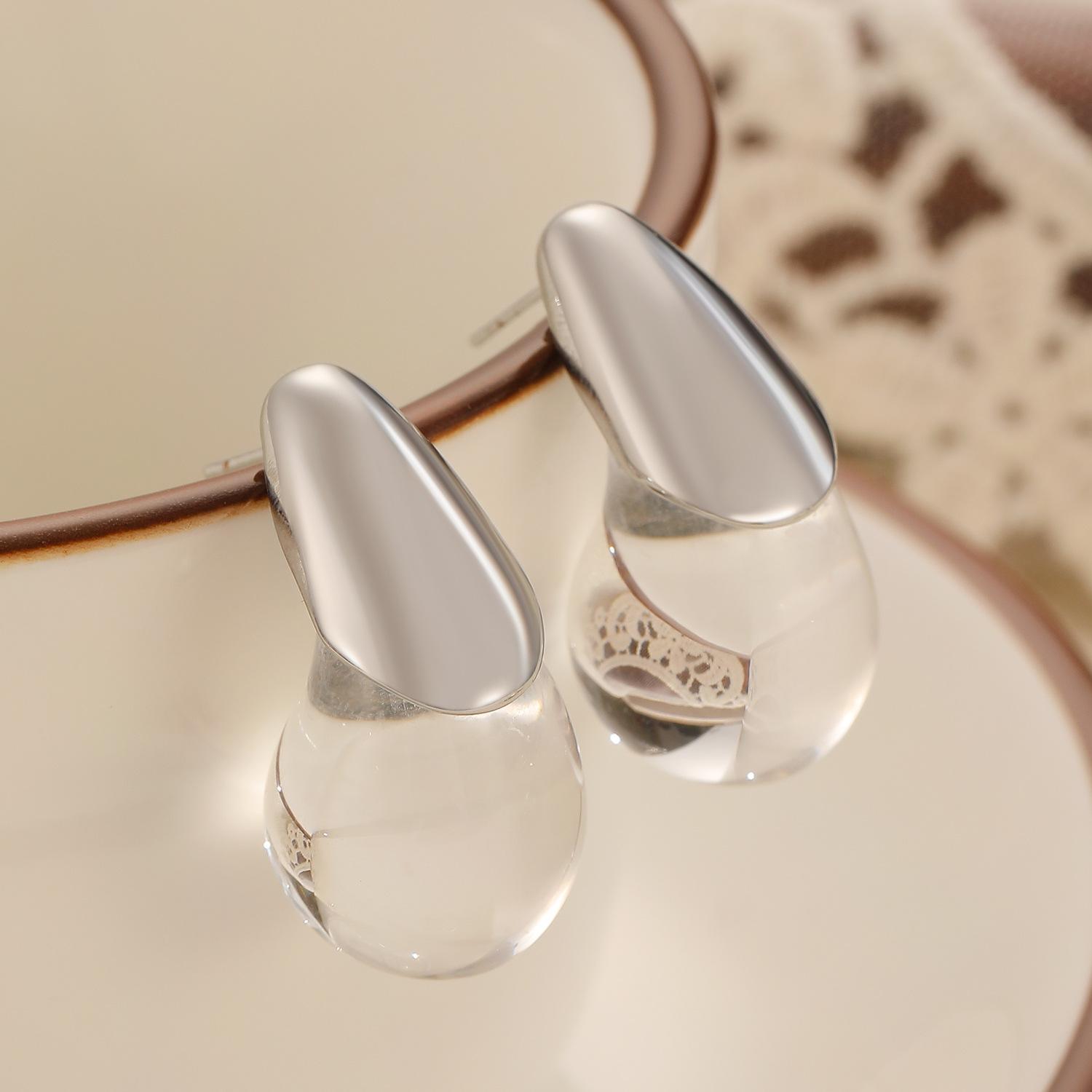 

Модные серьги-пусеты «капля воды» 2026 года, уникальная индивидуальность, прозрачные серьги из смолы, простые и изысканные серьги для通勤 (коммутирующие) оптом