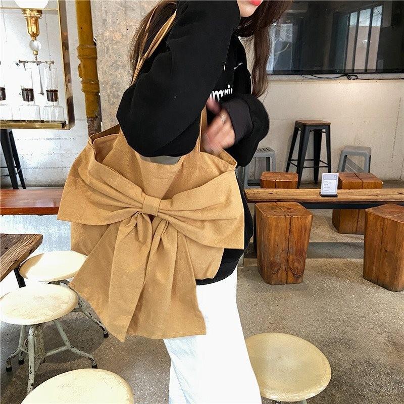 

Fresh And Stylish Yellow Bowknot Canvas Tote Bag For Girls Ideal For Daily Use