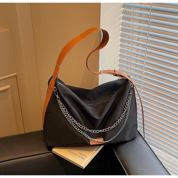 

Canvas bag women s large-capacity new summer niche messenger bag high-end chain commuter dumpling bag чёрный