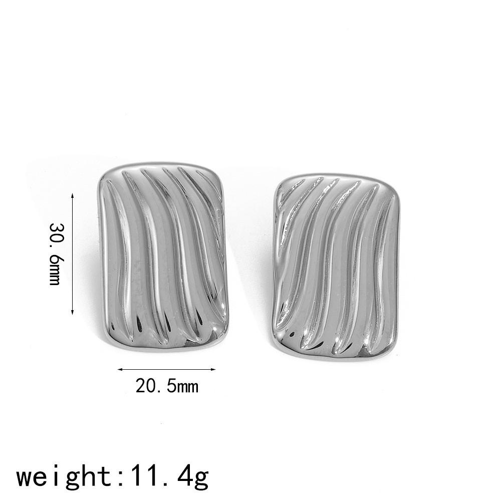 

Gold Titanium Steel Wavy Earrings With Electroplated Finish For Women срібний