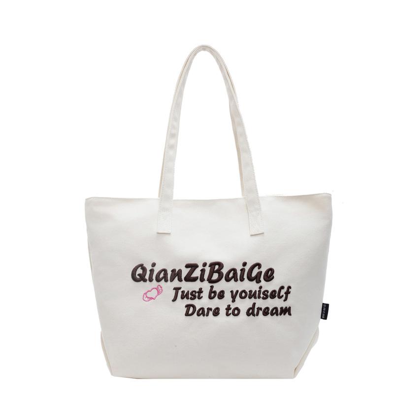 2024 autumn and winter new bag women's large-capacity handbag portable gift bag commute to school to work simple and fashionable