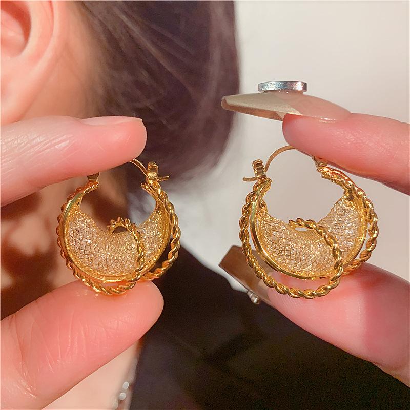 

Niche unique design winding mesh zircon earrings women s fashion personality exquisite earrings high-end temperament earrings