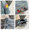 Borsa a tracolla da donna in denim con ricamo floreale