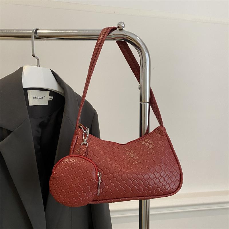 Niche woven bag women's spring popular crossbody bag foreign style fashionable and elegant one-shoulder underarm bag