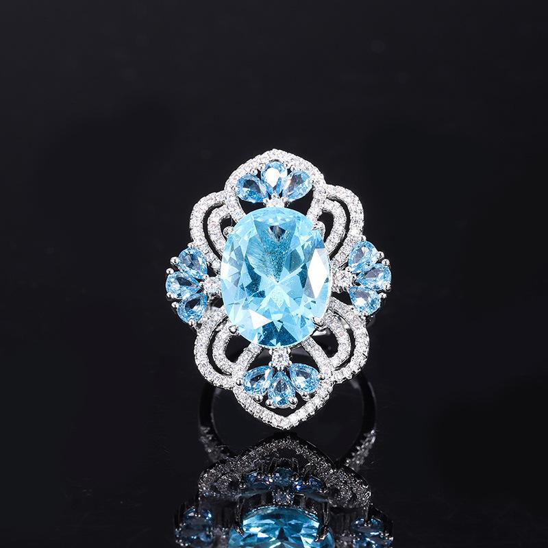 

Ювелирное изделие Имитация Топаз Синий Подвеска Кольцо Креативный Придворный Стиль Комплект Главный Камень 12 * 16