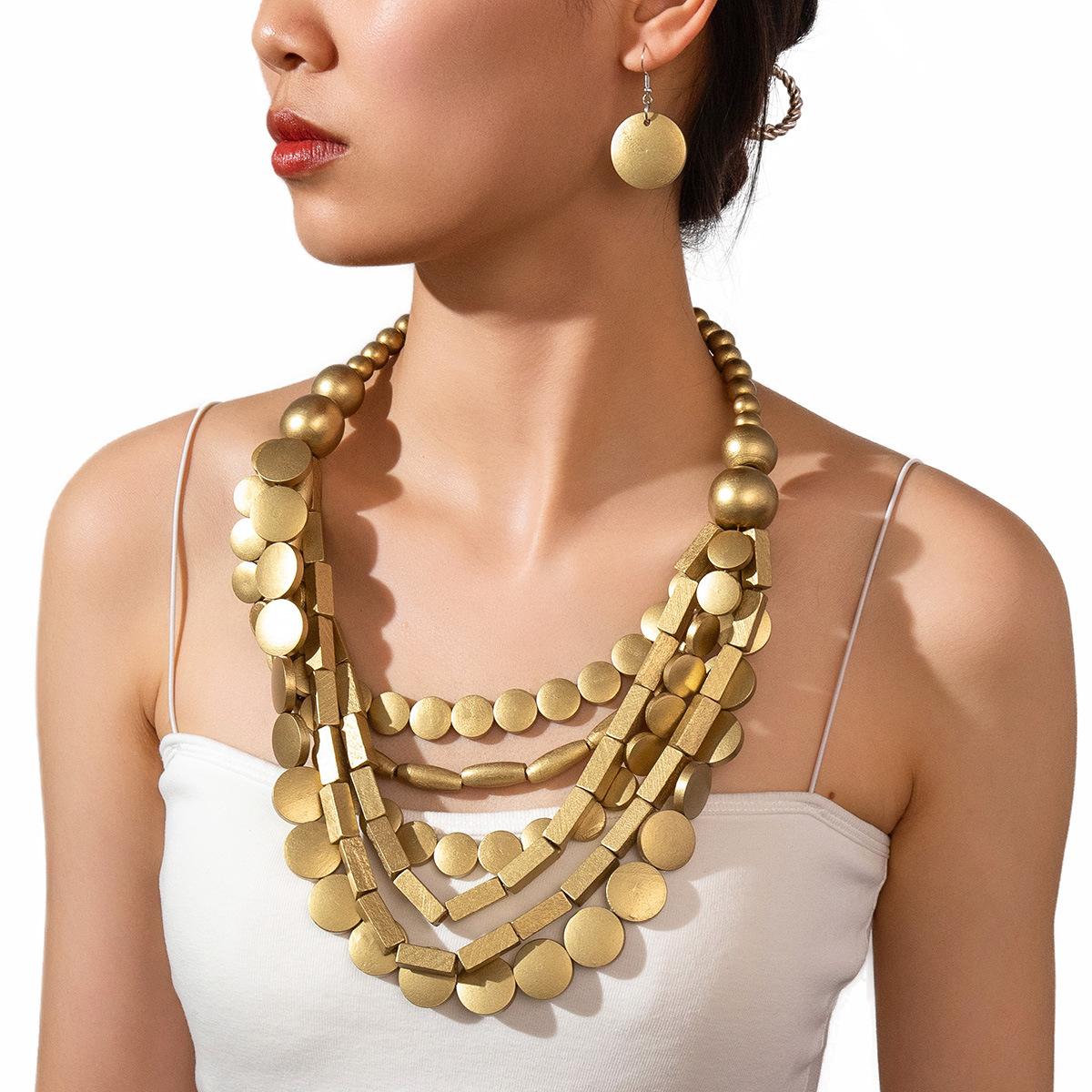 

Ретро творча особистість нерегулярні дерев яні намистини кулон модний ключиця ланцюжок намисто набір сережок золотий