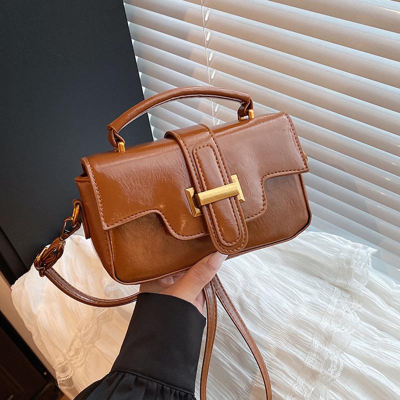 

New high-end handbag bag women s fashion versatile messenger bag retro simple niche design shoulder bag коричневый