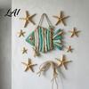 Handmade Driftwood Fish Wall Decor Rustic Coastal Hanging Ornament with Sea Glass Distressed Blue White Decor Jute Rope Bohemian Beach Style Art for