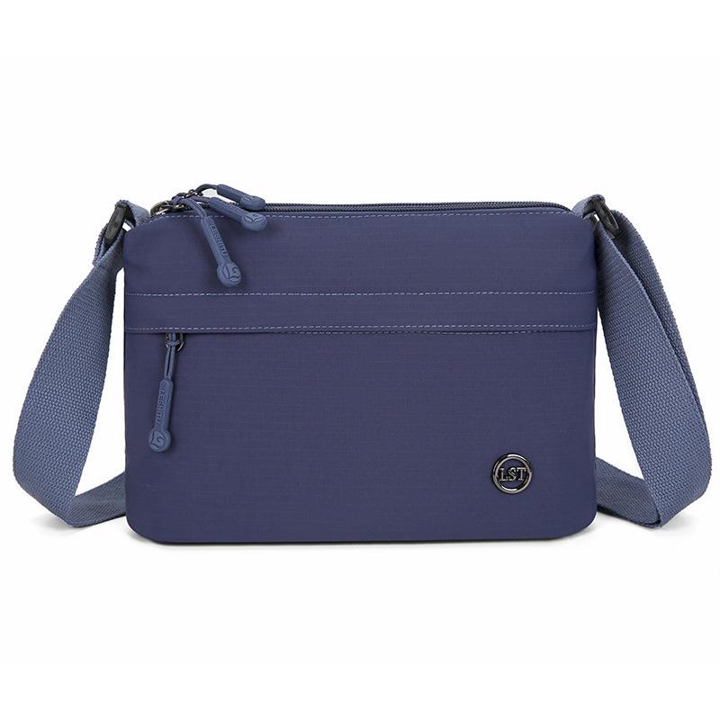 

Нейлонова багатосекційна жіноча сумка кросбоді через плече - Універсальна та трендова для поїздок на роботу синій