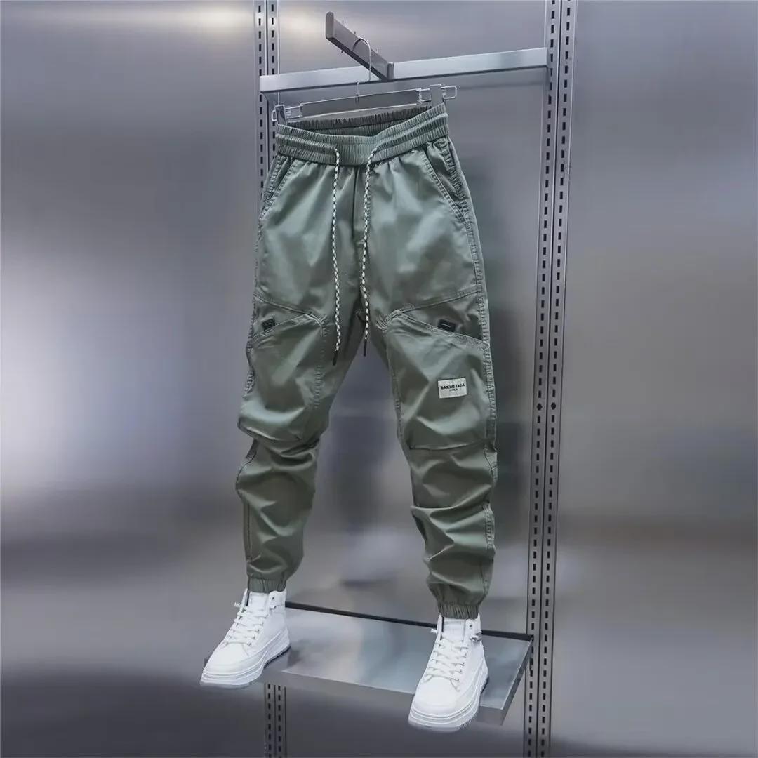 

2024 Мужские осенние однотонные узкие повседневные брюки с эластичной резинкой на талии L зелёный