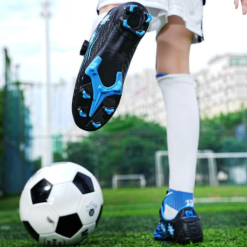 Drehknopf Kinderfußballschuhe Jungen Grund- und Sekundarschule Sonderspiele Fußballschuhe mit gebrochenen Stollen Rutschfeste Sportschuhe mit langen Stollen
