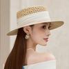 Hollow raffia flat top summer high-end travel seaside sunshade breathable straw hat sunshade French straw hat