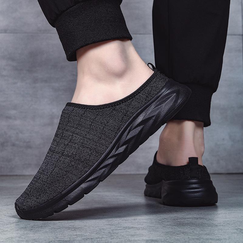 Trendig flugvävd mesh utan häl, halvt stöd, trendiga ultralätta extra stora vardagspappa-skor