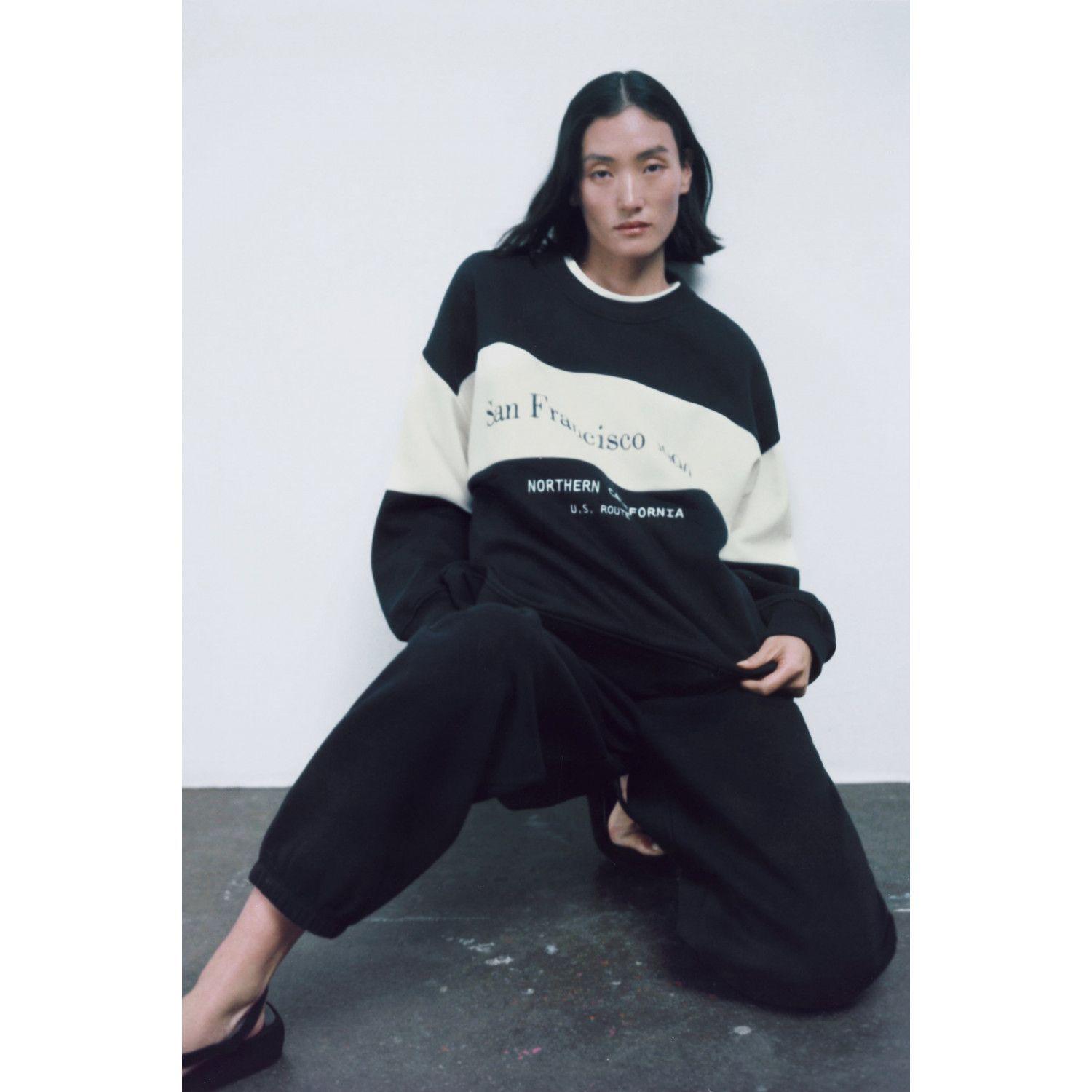 

SWEATSHIRT WITH EMBROIDERED SLOGAN