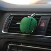 An apple-shaped car air freshener with floral fragrance - featuring a decorative ventilation clip design