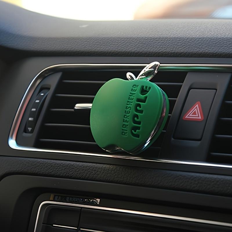 An apple-shaped car air freshener with floral fragrance - featuring a decorative ventilation clip design
