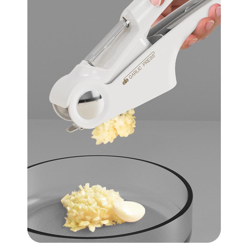 4-In-1 Stainless Steel Garlic Press - Multifunctional Manual Mincer, Crusher & Slicer for Kitchen and Restaurant Use verde
