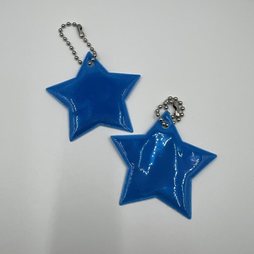 Reflective Star Pendant Keychain for Night Riding: Safety Accessory for Backpack or Luggage.