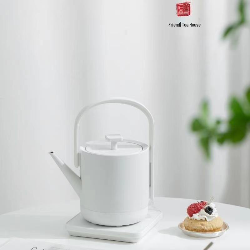 

Youmingtang Stainless Steel Electric Kettle: Compact, Auto Power-Off, Fast Boiling for Home/Office Tea Brewing. білий