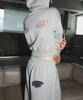Seulliggeullou Angel Applique Curved Sweatpants [Gray]