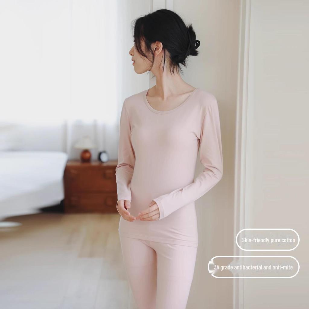 Dámský termo set z čisté bavlny: Tenký svetr a úzké kalhoty s kulatým výstřihem v jednobarevných barvách na podzim a zimu.